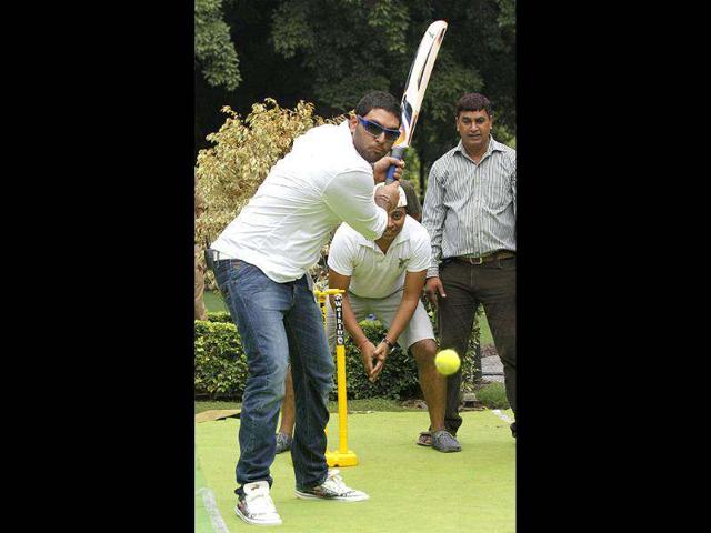 Cricketer and cancer survivor Yuvraj Singh playing cricket during a YouWeCan event for the Yuvraj Singh Cancer Foundation in New Delhi. HT/Virendra Singh Gosain