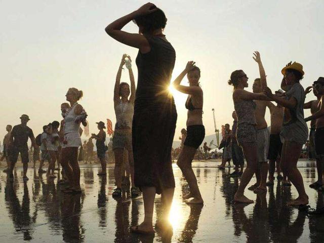 Revellers dance during the Pohoda music festival at Trencin airport 130 km (81 miles), north of Bratislava. Pohoda, the largest Slovak open-air music festival, is attended by almost 30,000 of visitors. Reuters/Radovan Stoklasa