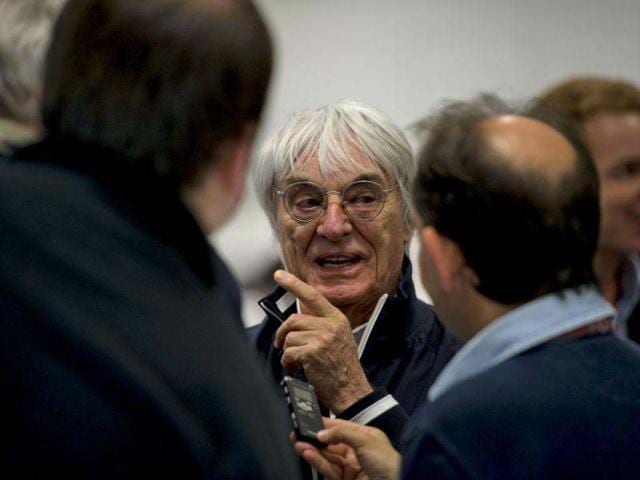 Formula One commercial director Bernie Ecclestone talks to journalists during a visit at the international press center at the Silverstone circuit ahead of the British Formula 1 Grand Prix. AP/Tom Hevezi
