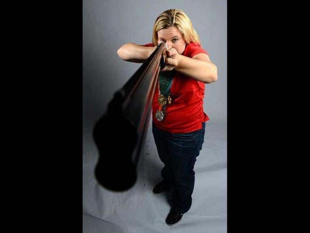 Kim Rhode of the US Shooting Olympic team poses for pictures during the 2012 Team USA Media Summit in Dallas, Texas. Portraits of the US Olympic team taken by AFP photographer Joe Klamar have been criticised for using awkward poses, wrong lens and lighting. Joe brushed off most of the criticism, saying that his "only goal was to show them as interesting, as special people who deserve their fame because they are the best as what they do". AFP/Joe Klamar Kim Rhode of the US Shooting Olympic team poses for pictures during the 2012 Team USA Media Summit in Dallas, Texas. Portraits of the US Olympic team taken by AFP photographer Joe Klamar have been criticised for using awkward poses, wrong lens and lighting. Joe brushed off most of the criticism, saying that his "only goal was to show them as interesting, as special people who deserve their fame because they are the best as what they do". AFP/Joe Klamar