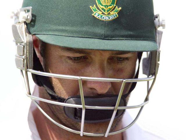 South Africa's Mark Boucher looks down as he leaves the ground after being bowled out by New Zealand's Mark Gillespie on day two of the second international cricket test match in Hamilton. The South African keeper has retired from international cricket following an eye injury during a match against Somerset. (Reuters)
