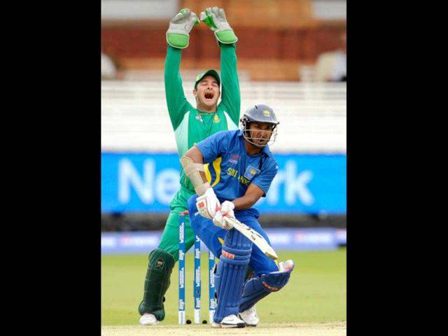 Sri Lanka's Kumar Sangakkara is out lbw as South Africa's wicketkeeper Mark Boucher appeals during the ICC World Twenty20 Warm-up Match at Lord's Cricket Ground in London. The South African keeper has retired from international cricket following an eye injury during a match against Somerset. (Reuters)