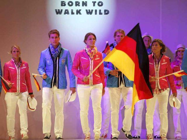 German fencing champion Britta Heidemann (C) and athletes present the official uniforms of the German Olympic team for the 2012 Olympic Games in Duesseldorf. (Reuters/Ina Fassbender)