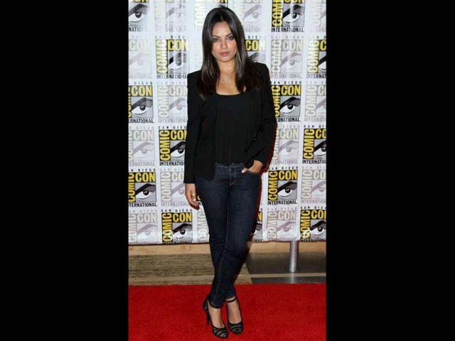 Mila Kunis, from the film Oz: The Great and Powerful, arrives at the Disney press line during Comic-Con (AP)