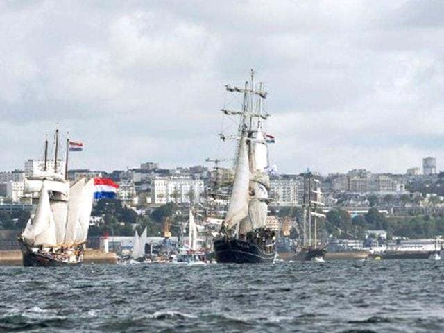 Traditional boats sail in Brest seaport as part of the 2012 Tonnerres de Brest maritime festival which features thousands of traditional sailboats .(AFP Photo/Alain Jocard)