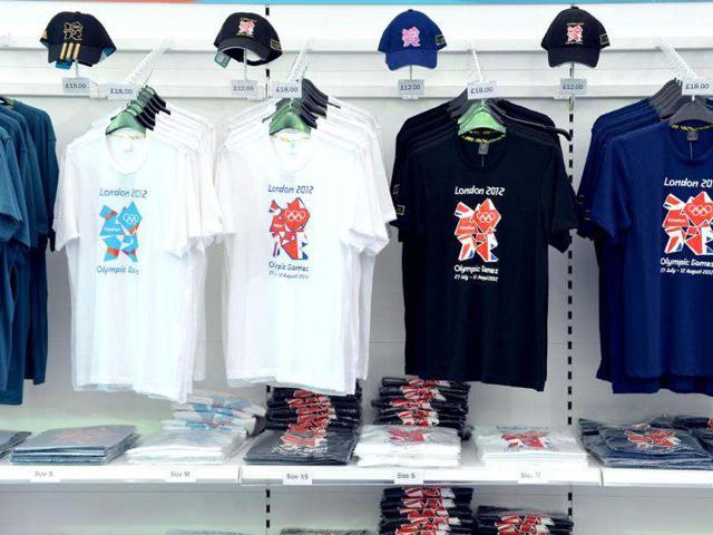 London Olympic t-shirts and base-ball caps are displayed at the largest pop-up store in Hyde Park, London. AFP/Miguel Medina