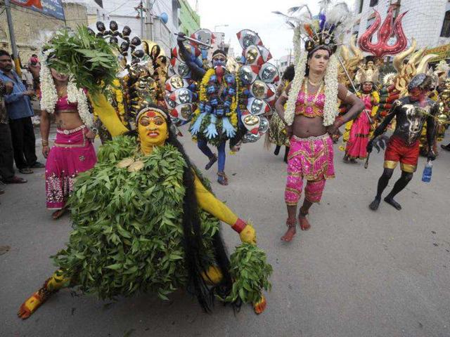 Performers dressed up as different forms of Goddess Mahakali take part in the annual Hindu religious festival of Bonalu. Reuters/Krishnendu Halder Performers dressed up as different forms of Goddess Mahakali take part in the annual Hindu religious festival of Bonalu. Reuters/Krishnendu Halder