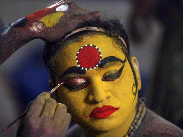A performer gets his make-up done during the annual Hindu religious festival of Bonalu. Reuters/Krishnendu Halder A performer gets his make-up done during the annual Hindu religious festival of Bonalu. Reuters/Krishnendu Halder