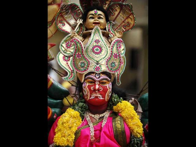 A woman dressed as Goddess Mahakali performs a procession of Bonalu festival in Hyderabad. AP/Mahesh Kumar A A woman dressed as Goddess Mahakali performs a procession of Bonalu festival in Hyderabad. AP/Mahesh Kumar A