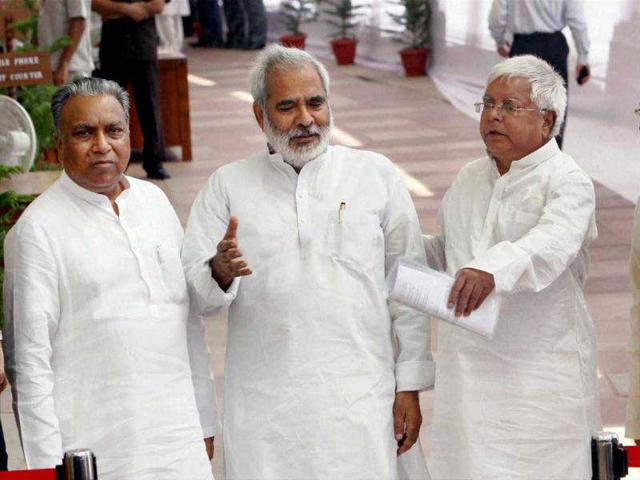 RJD supremo Lalu Prasad along with party MPs after casting vote for the election of the President in Parliament House in New Delhi. PTI photo/Shahbaz Khan