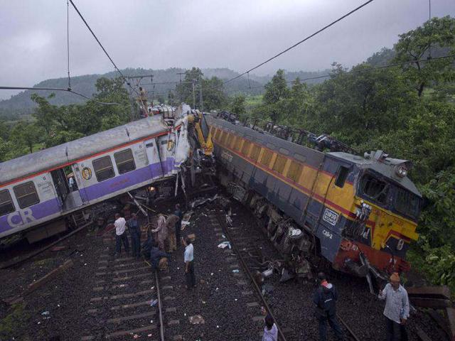 Rescue-personnel-work-near-the-derailed-locomotive-of-the-Vidarbha-Express-and-a-local-commuter-train-near-Kasara-about-100km-from-Mumbai-Reuters-photo-Vivek-Prakash Rescue-personnel-work-near-the-derailed-locomotive-of-the-Vidarbha-Express-and-a-local-commuter-train-near-Kasara-about-100km-from-Mumbai-Reuters-photo-Vivek-Prakash