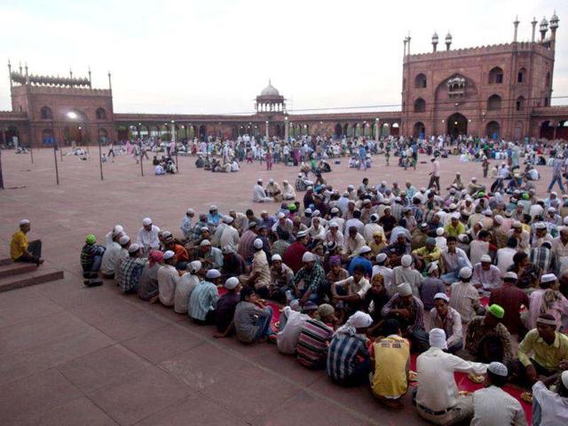 Muslims have their Iftar (fast-breaking) meal during the holy month of Ramadan at the Jama Masjid (Grand Mosque) in the old quarters of Delhi. (Reuters)