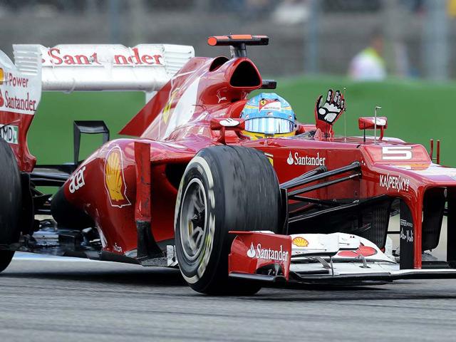 Ferrari Formula One driver Fernando Alonso of Spain celebrates winning the German F1 Grand Prix at the Hockenheimring in Hockenheim. REUTERS/Fabian Bimmer Ferrari Formula One driver Fernando Alonso of Spain celebrates winning the German F1 Grand Prix at the Hockenheimring in Hockenheim. REUTERS/Fabian Bimmer