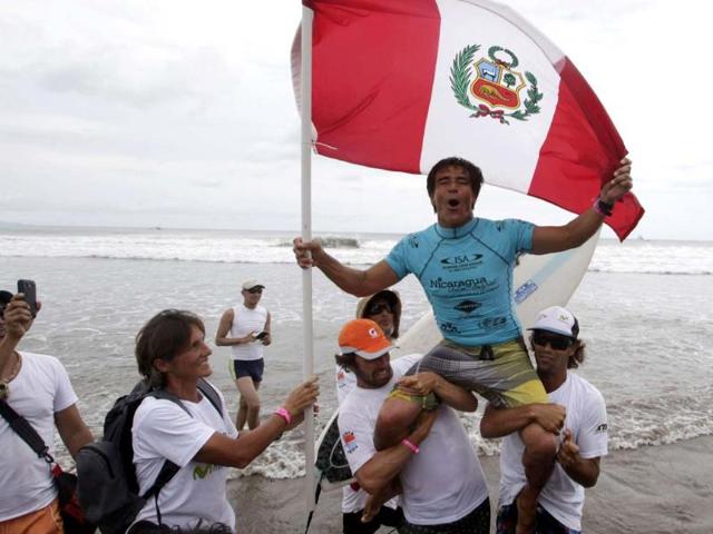 Javier Huarcaya of Peru celebrates after winning the Grand Kahunas finals in the International Surfing Association World Surfing Championship 2012 at Colorado beach in Tola Nicaragua. Reuters/Oswaldo Rivas