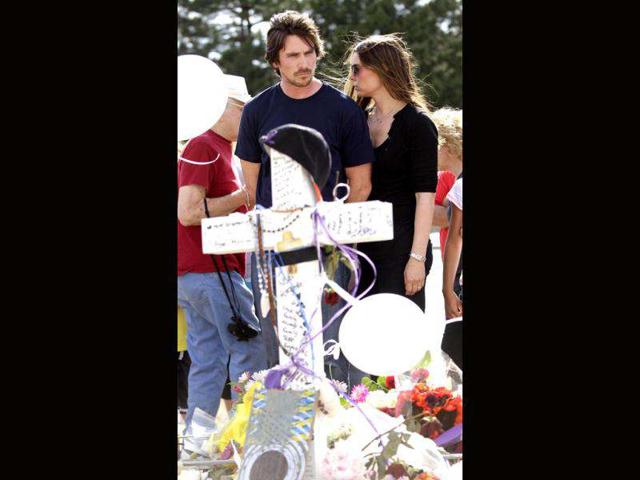 Actor Christian Bale and his wife Sandra Blazic at the memorial across the street from the Century 16 movie theater, where the shooting happened, last Friday.