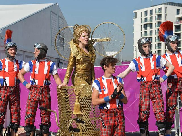 Dancers perform during an arrival ceremony for athletes at the Olympic Village in London, two days before the start of the London 2012 Olympic Games. AFP/Adek Berry