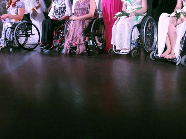 Models with physical disabilities take part in a "Fashion week chance" show in Kiev. Ukrainian fashion designers presented haute couture collections for women with physical disabilities at a special show in Kiev. REUTERS/Gleb Garanich