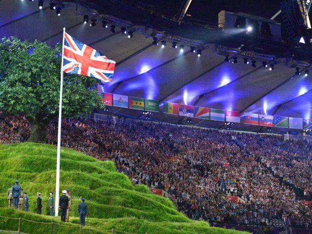 The Union Flag is raised during the opening ceremony of the London 2012 Olympic Games at the Olympic Stadium in London. (AFP photo/Jewel Samad)