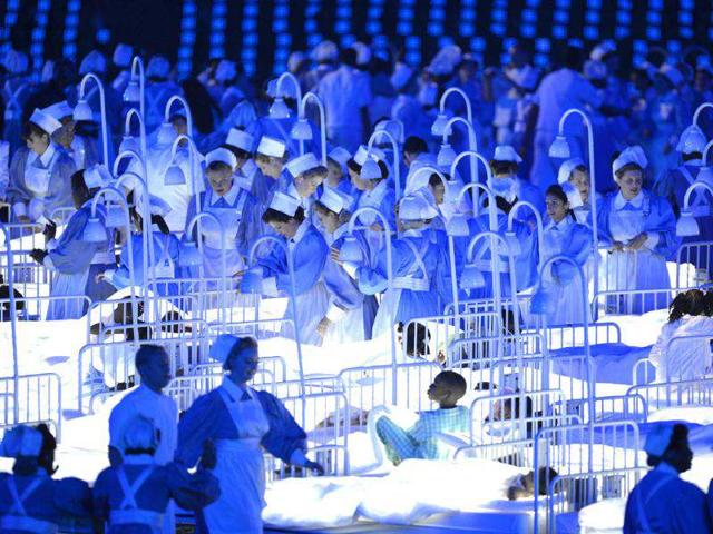 Dancers perform in the Gosh and NHS scene during the opening ceremony of the London 2012 Olympic Games at the Olympic Stadium in London. (AFP photo/Odd Andersen)