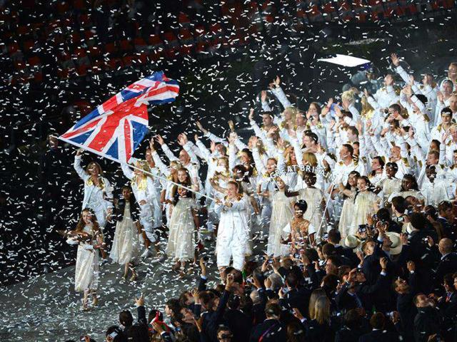 Britain's flagbearer Chris Hoy leads his country's delegation parade during the opening ceremony of the London 2012 Olympic Games at the Olympic stadium in London. AFP/Ben Stansall
