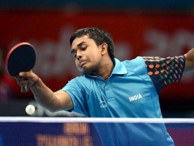 Indian-paddler-Soumyajit-Ghosh-serves-to-Brazil-s-Gustavo-Tsuboi-during-a-table-tennis-men-s-singles-preliminary-round-match-of-the-London-2012-Olympic-Games-at-the-Excel-centre-in-London-AFP-Saeed-Khan