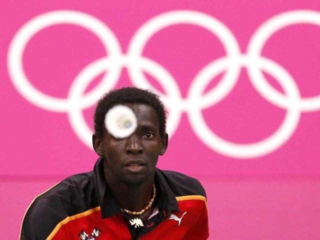 Uganda's Edin Ekiring plays against Hong Kong's Wong Wing Ki during their men's singles group play stage Group F badminton match during the London 2012 Olympic Games at the Wembley Arena. Reuters/Bazuki Muhammad