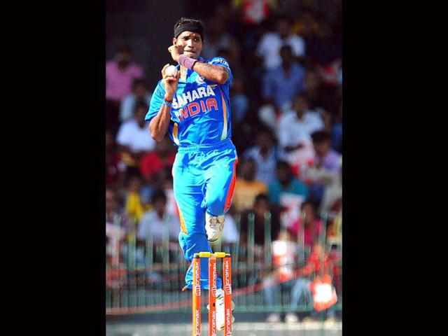 Indian cricketer Ashok Dinda delivers a ball during the fourth one day international (ODI) match between Sri Lanka and India at the R Premadasa Cricket Stadium in Colombo. AFP Photo