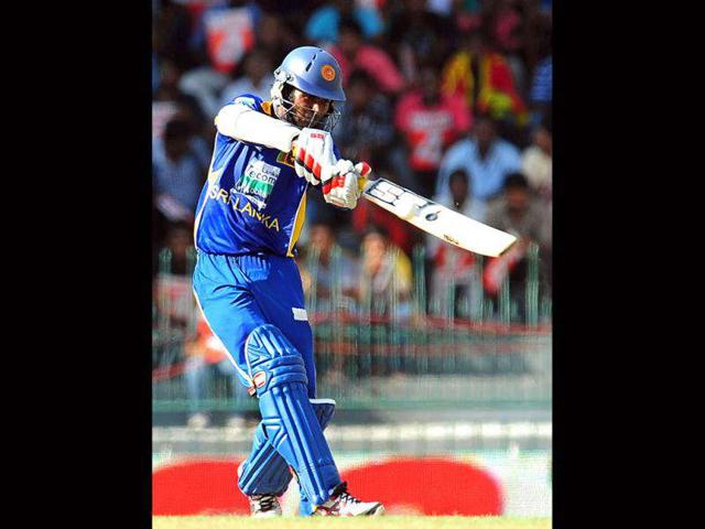 Sri Lankan cricketer Upul Tharanga plays a shot during the fourth one day international (ODI) match between Sri Lanka and India at the R Premadasa Cricket Stadium in Colombo. AFP Photo/Lakruwan Wanniarachchi