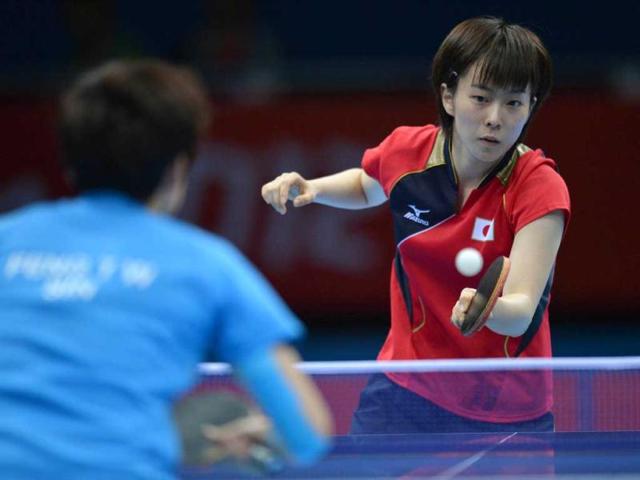 Japan's Kasumi Ishikawa plays a return during her table tennis women's bronze medal singles match against Singapore's Feng Tianwei for The London 2012 Olympic Games at The Excel Centre in London. AFP Photo/Saeed Khan