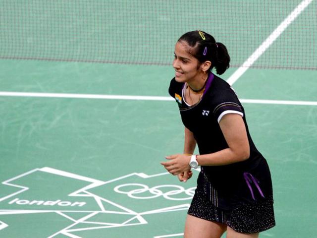 Saina Nehwal celebrates her victory over Tine Baun of Denmark after a quarterfinal women's singles badminton match at the London 2012 Olympics. (AFP Photo)