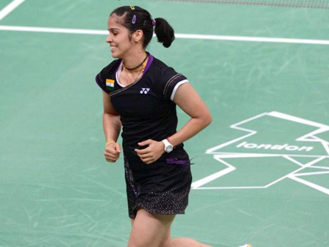 Saina Nehwal celebrates her victory over Tine Baun of Denmark after a quarterfinal women's singles badminton match at the London 2012 Olympics. (AFP Photo)