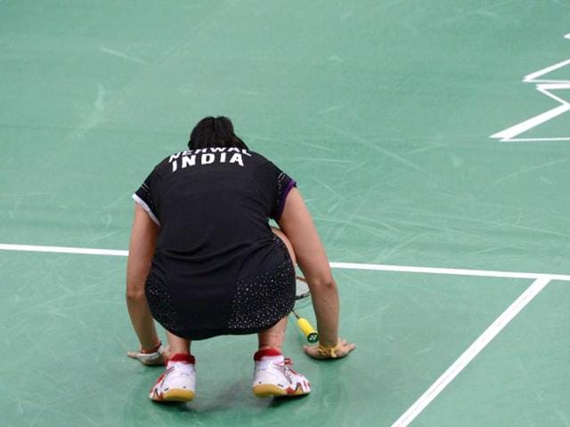 Saina Nehwal reacts after her victory over Tine Baun of Denmark after a quarterfinal women's singles badminton match at the London 2012 Olympics. (AFP Photo)