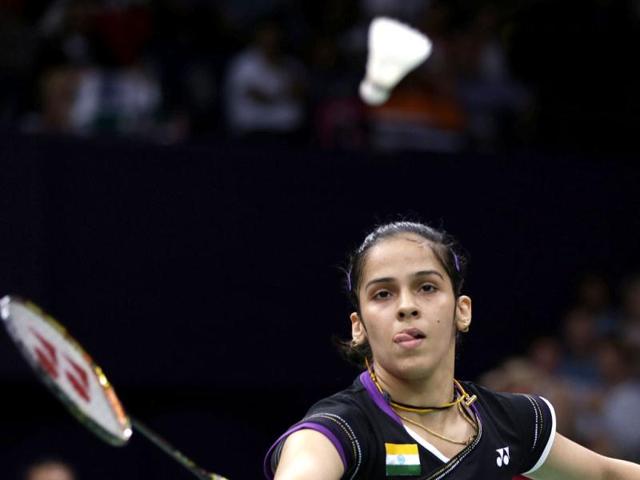 Saina Nehwal returns a shot to Tine Baun of Denmark at the 2012 Summer Olympics, in London. (AP Photo)