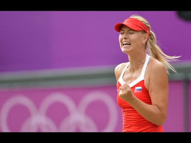 Russia-s-Maria-Sharapova-celebrates-her-victory-over-Russia-s-Maria-Kirilenko-in-their-women-s-single-tennis-semifinal-match-at-the-London-2012-Olympic-Games-in-London-AFP-Luis-Acosta