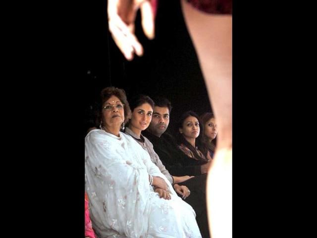 Onlooker: Kareena Kapoor attends a catwalk presentation on the first day of Lakme Fashion Week Winter/Festive 2012. (AFP Photo)