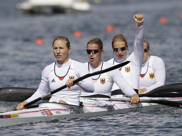 Germany's, left to right, Carolin Leonhard, Franziska Weber, Katrin Wagner-Ausutrin and Tina Dietze celebrate after winning a women's kayak four 500m heat in Eton Dorney, near Windsor, England, at the 2012 Summer Olympics. (AP Photo/Armando Franca)