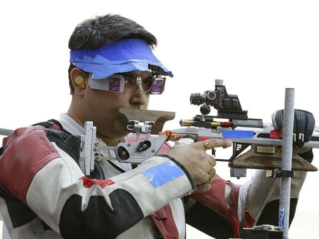 India's Gagan Narang prepares to shoot, during qualifiers for the men's 50-meter rifle 3 positions, at the 2012 Summer Olympics in London. (AP Photo/Rebecca Blackwell)
