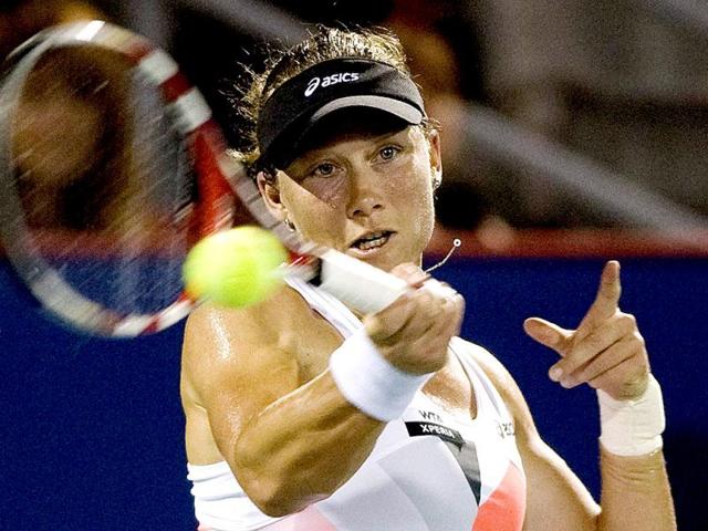 Australia's Samantha Stosur returns the ball to Simona Halep, from Romania, during the Rogers Cup women's tennis tournament in Montreal. AP Photo