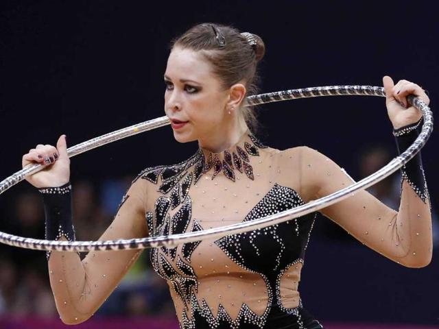 Britain's Francesca Jones performs her hoop program during the individual all-around qualifications of the rhythmic gymnastics event of the London Olympic Games at Wembley arena in London. AFP/Thomas Coex