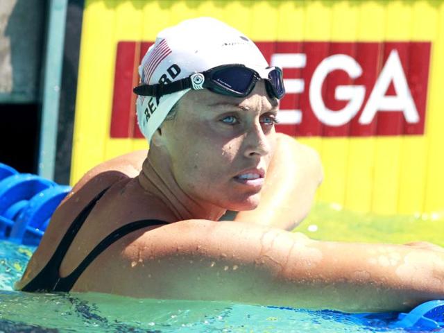 With looks befitting a Victoria's Secret model, American swimmer Amanda Beard is a 7-time Olympic champion. Reuters/Christinne Muschi