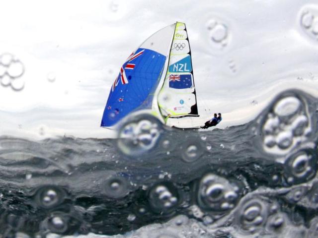 New Zealand's Peter Burling and Blair Tuke sail before the fifth race of the men's 49er sailing class at the London 2012 Olympic Games in Weymouth and Portland, southern England. Reuters/Pascal Lauener