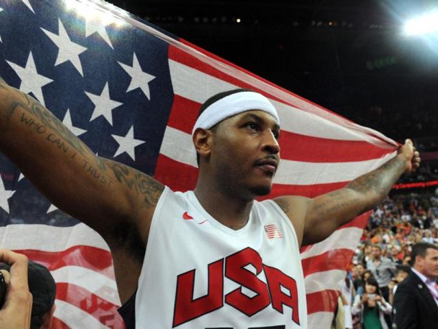 US forward Carmelo Anthony celebrates after winning the London 2012 Olympic Games men's gold medal basketball game between USA and Spain at the North Greenwich Arena in London. AFP Photo/Mark Ralston