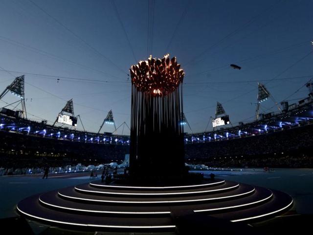 The Olympic Flame burns in the Olympic Stadium before the closing ceremony of the London 2012 Olympic Games. (Reuters/Pawel Kopczynski)