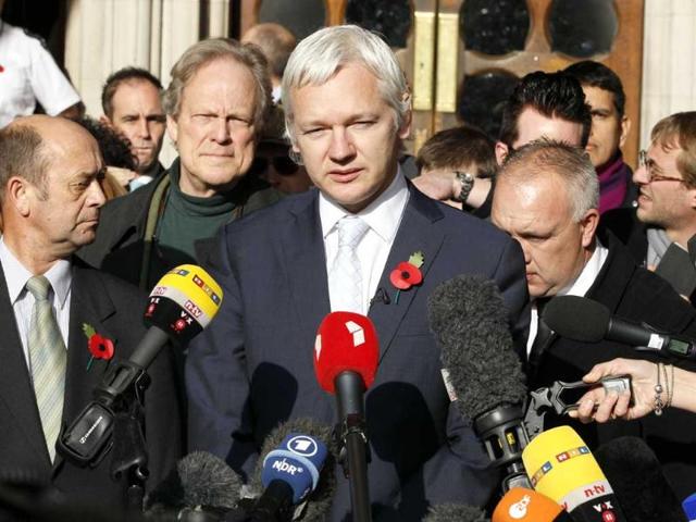 File-The-founder-of-WikiLeaks-Julian-Assange-center-gives-a-statement-to-the-media-after-his-extradition-hearing-at-the-high-court-in-London-Ecuador-accused-Britain-of-threatening-to-storm-its-London-embassy-to-arrest-Assange-after-the-UK-issued-a-stern-warning-to-the-South-American-nation-ahead-of-its-decision-on-an-asylum-bid-by-the-WikiLeaks-founder-AP-Kirsty-Wigglesworth