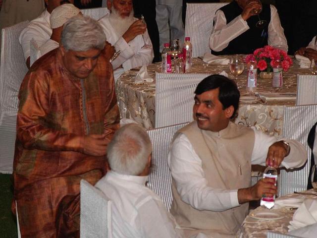 Lyricist Javed Akhtar, RJD president Laloo Prasad Yadav and senior BJP leader Syed Shahnawaz Hussain at an Iftar Party at Prime Minister's residence in New Delhi.
