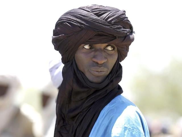 A Tuareg herdsman looks at livestock at the market in Bermo, Niger, 200 kms north of Maradi. AP/Jerome Delay
