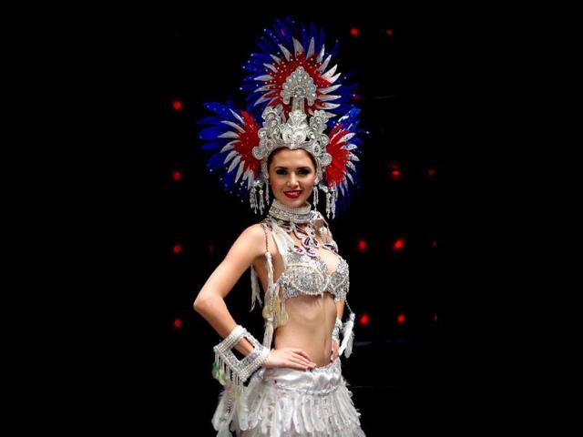 Miss World contestant, Panama's Maricely Pomares, poses for a photo as she waits backstage prior to a rehearsal for the final ceremony at the Ordos Stadium Arena in the inner Mongolian city of Ordos. AFP Photo