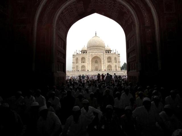 Muslims offer Eid al-Fitr prayer at Taj Mahal in Agra, marking the end of the holy fasting month of Ramadan. (AP Photo/Rajesh Kumar Singh)