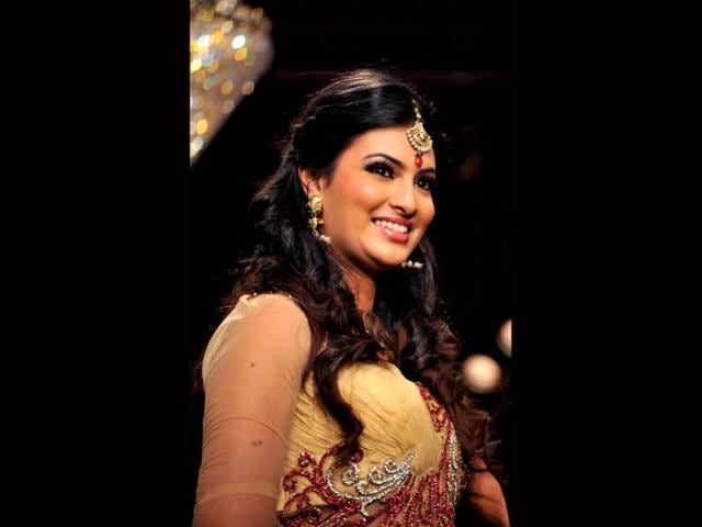 Sayali Bhagat walks the ramp for Gitanjali's BETI Foundation on the first day of India International Jewellery Week 2012. (Photo: AFP) Sayali Bhagat walks the ramp for Gitanjali's BETI Foundation on the first day of India International Jewellery Week 2012. (Photo: AFP)