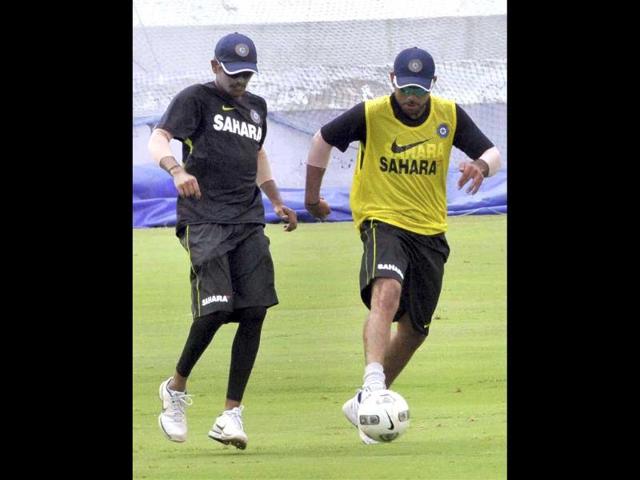 Virat Kohli playing football with a teammate during a practice session in Hyderabad ahead of the first cricket test match against New Zealand. PTI Virat Kohli playing football with a teammate during a practice session in Hyderabad ahead of the first cricket test match against New Zealand. PTI